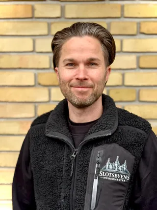 Indehaver af Slotsbyens Murermester